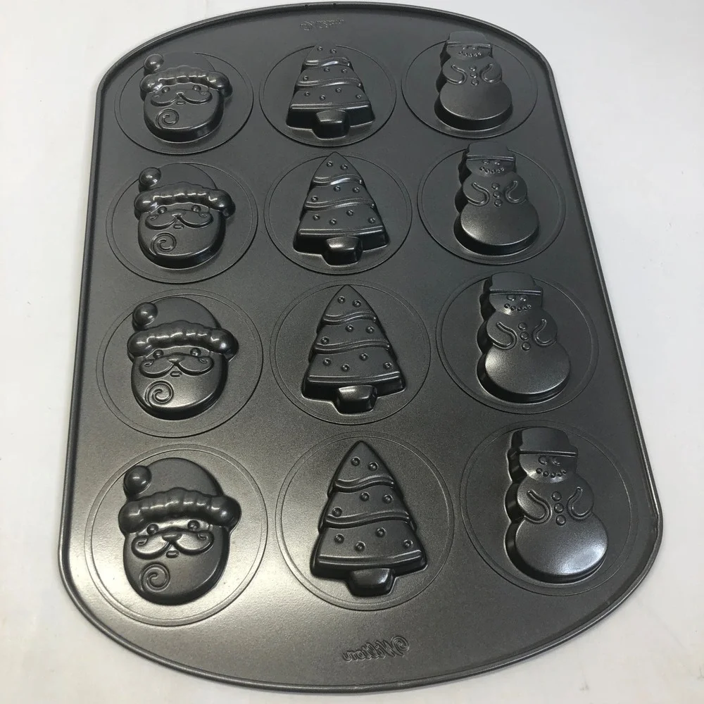 Wilton 12 Cup‎ Christmas Holiday Baking Pan Snowman Tree Santa Claus Molds